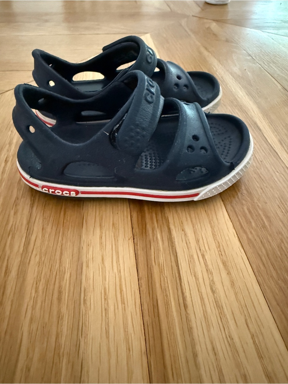CROCS Navy Kids' Sandal with Red and White Sole Trim